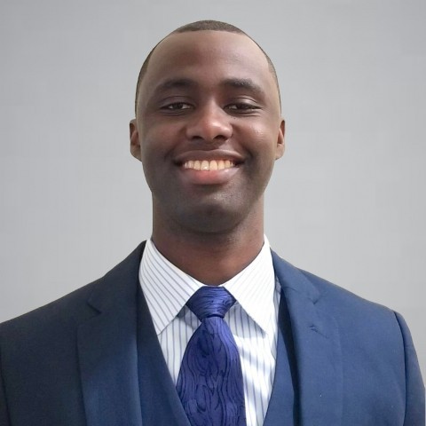 Sean Ashley, a President’s Postdoctoral Fellow at the University of Maryland, smiling in his headshot.